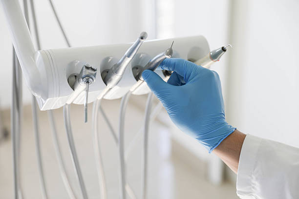 Professional Tooth Extraction technician working in Port Jefferson, NY